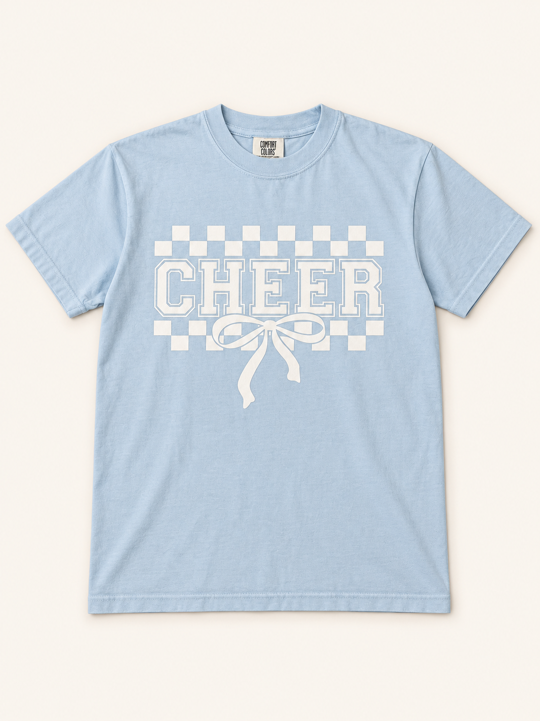 Cheer Checkerboard Bow Tee on a light blue Comfort Colors shirt