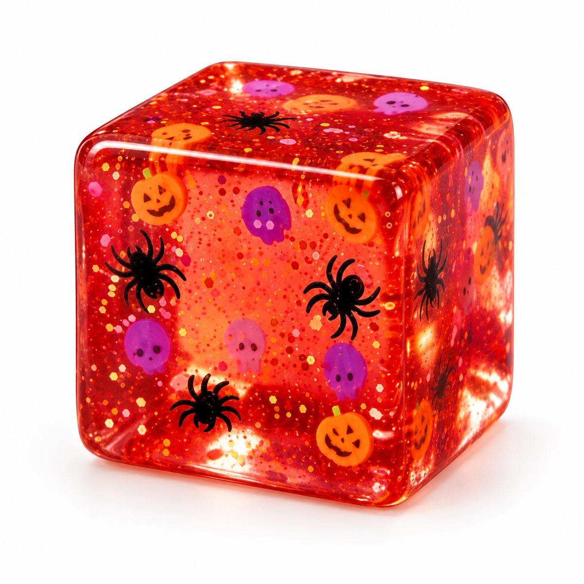 translucent orange Halloween cube with little spiders, pumpkins and ghost decorations embedded on white background