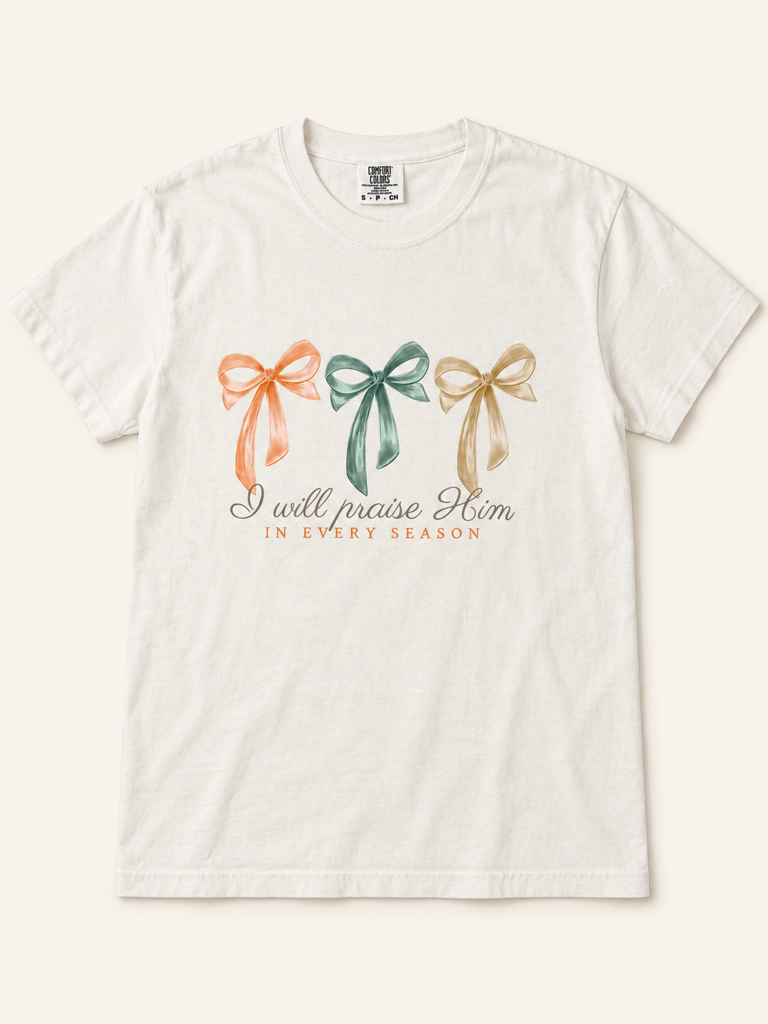 I Will Praise Him in Every Season Bow Tee on a ivory Comfort Colors shirt