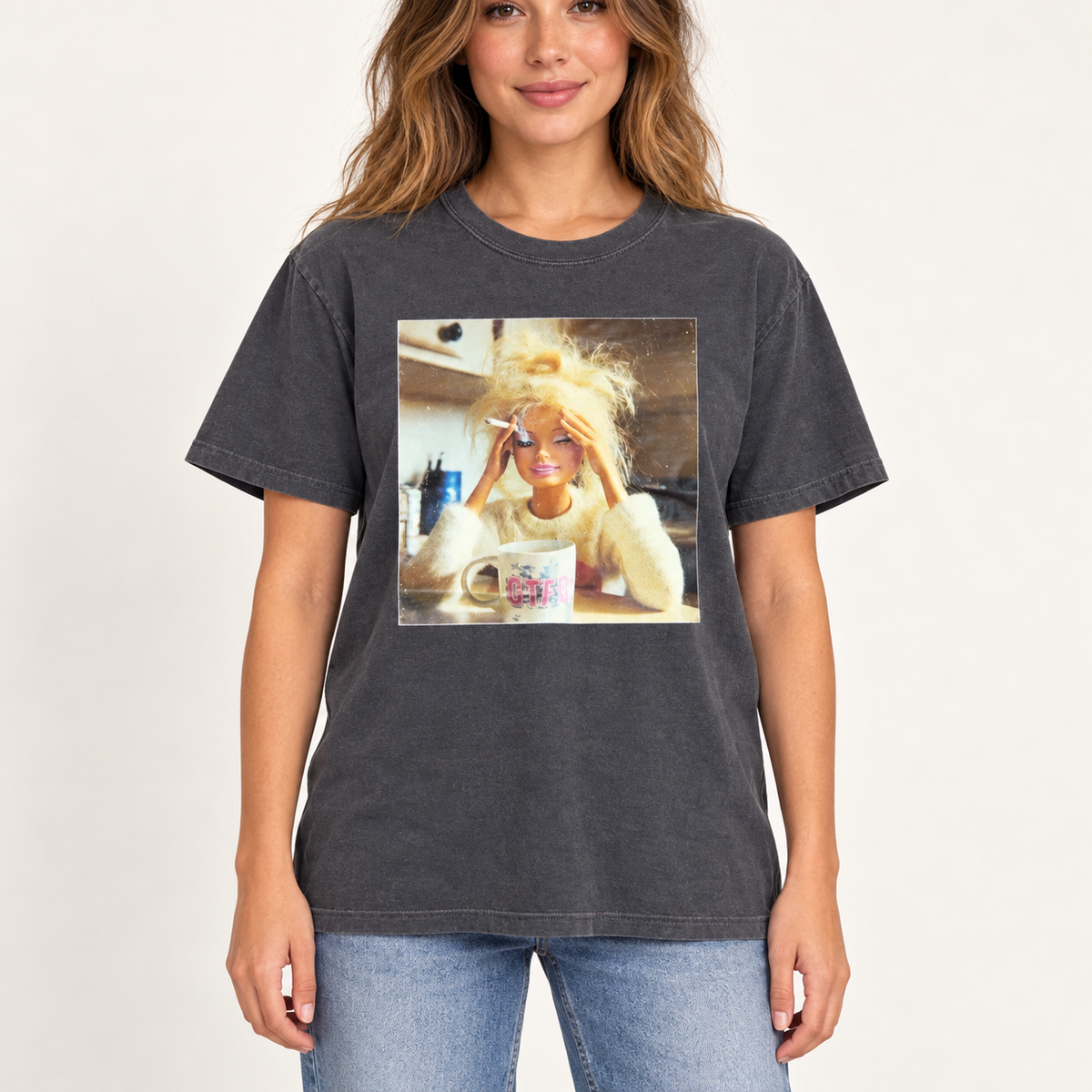 Tired Mom Doll charcoal graphic tee shown on a model